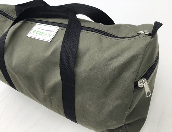 Green work bag with black handles